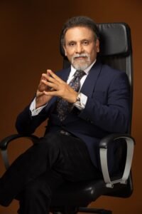 Photo of Dr. Sanjay Parashar Sitting On a chair