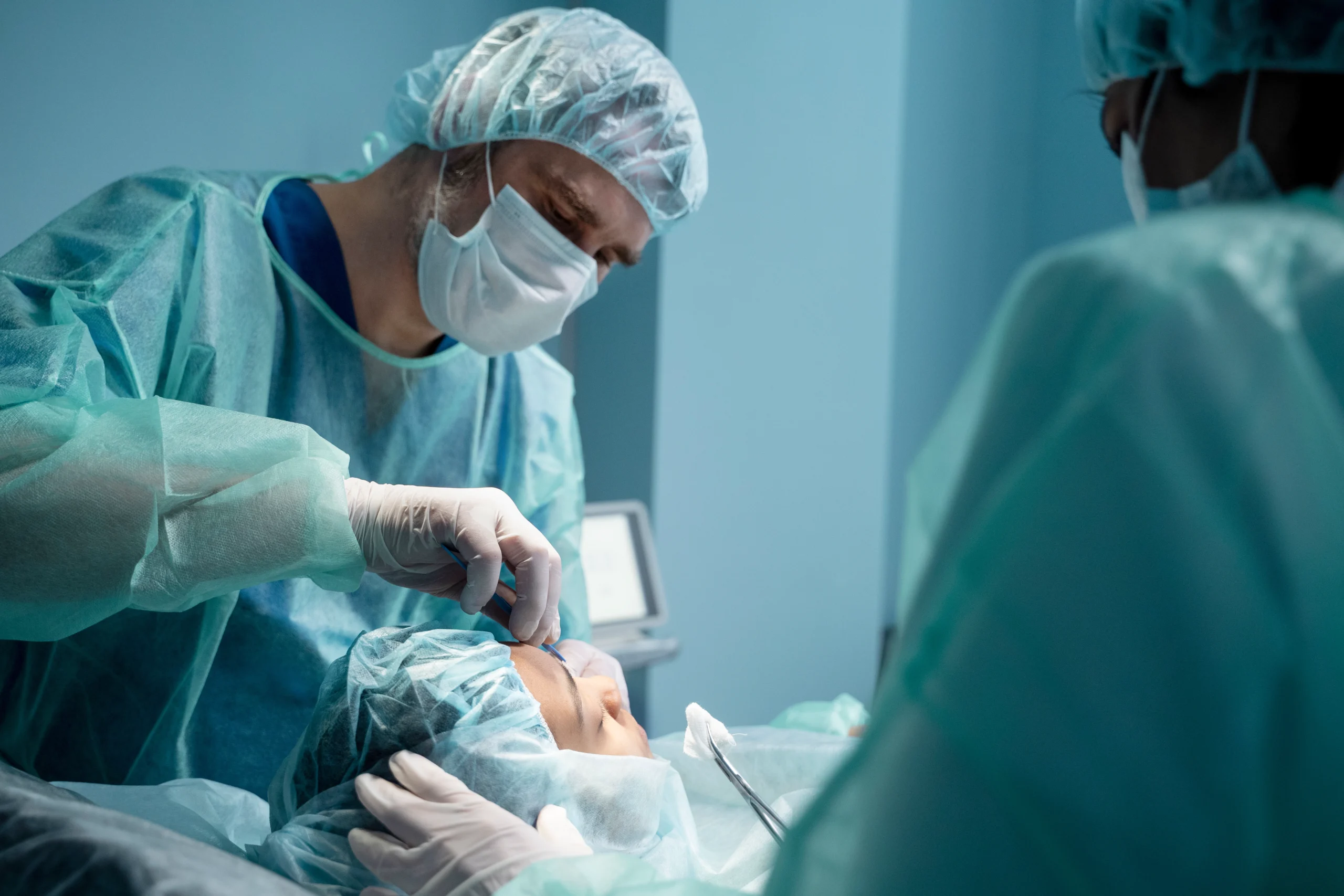 Surgeon performing ultrasonic rhinoplasty in Dubai